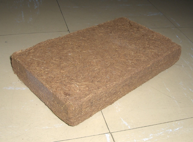 Compressed brick of coco coir, a sustainable potting soil amendment